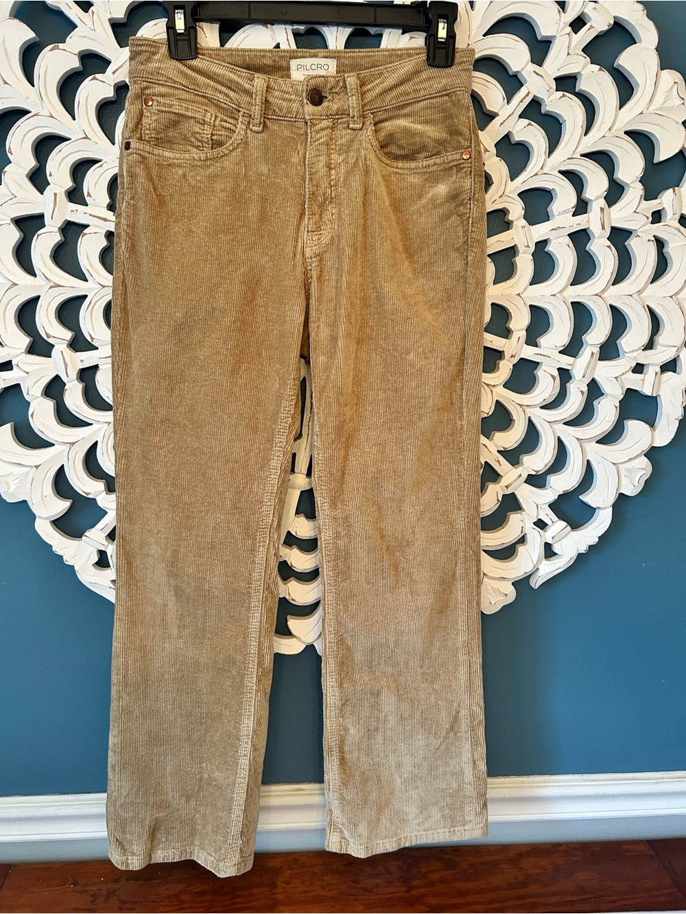 Pilcro x Anthropologie corduroy pants in a versatile tan color.